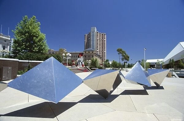 Modern sculpture between Parliament House and the Festival Centre on North Terrace at the heart of South Australias capital with the Hyatt Hotel beyond, Adelaide, South Australia