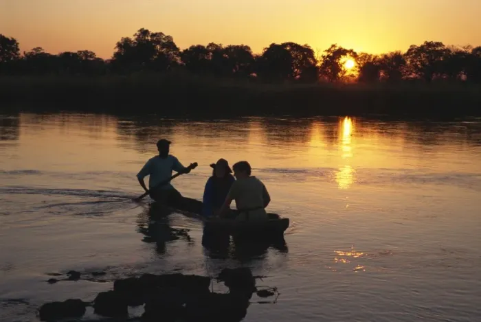 Framed Print : Mokoro river trip at sunset, Popa Falls, Caprivi Strip, Namibia, Africa Framed Print : Mokoro river trip at sunset, Popa Falls, Caprivi Strip, Namibia, Africa