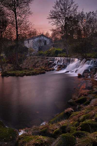 Mondim de Basto waterfall with a mill house at sunset, Norte, Portugal, Europe