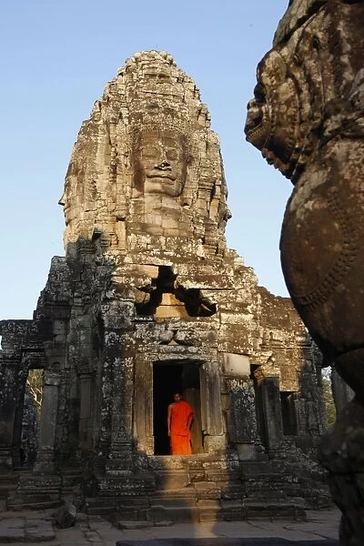 Monk at the Bayon temple, Angkor Thom Complex, Angkor, UNESCO World Heritage Site