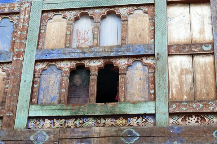 Framed Print : Monk looking out of window with fading blue paint in Wangdue Chhoeling Palace, in Framed Print : Monk looking out of window with fading blue paint in Wangdue Chhoeling Palace, in