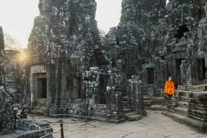 Framed Print : Monk sitting sitting in the Bayon temple, UNESCO World Heritage Site, Angkor, Siem Reap Framed Print : Monk sitting sitting in the Bayon temple, UNESCO World Heritage Site, Angkor, Siem Reap