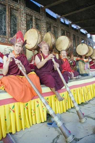 Monks playing horns at a Tsechu (festiva), Gangtey Gompa (Monastery), Phobjikha Valley