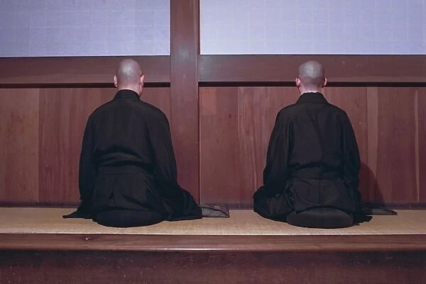 Two monks during Za-Zen meditation in the Sodo or Zazendo hall