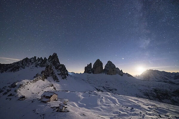Monte Paterno, Tre Cime di Lavaredo and Rifugio Locatelli hut lit by moon