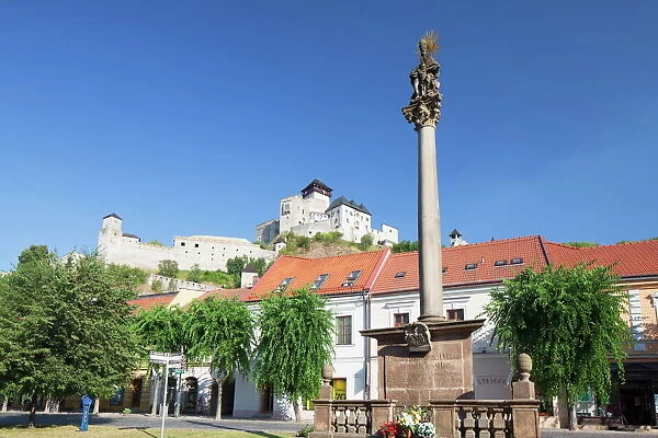 Monument in Mierove Square and Trencin Castle, Trencin, Trencin Region, Slovakia, Europe
