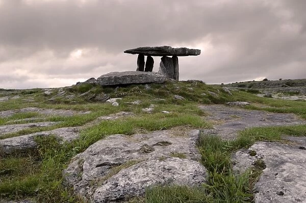 Moody sky over Poulnabrone Dolmen Portal Megalithic tomb at dusk