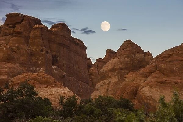 Full moon over Fiery Furnace, a maze like passageway, Arches National Park, Utah, United States of America, North America