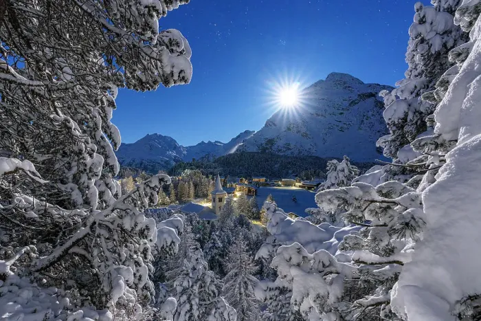 Framed Print : Moon glowing over the snowy bell tower of Chiesa Bianca and woods in winter, Maloja, Bregaglia, Engadine, Canton of Graubunden, Switzerland, Europe Framed Print : Moon glowing over the snowy bell tower of Chiesa Bianca and woods in winter, Maloja, Bregaglia, Engadine, Canton of Graubunden, Switzerland, Europe