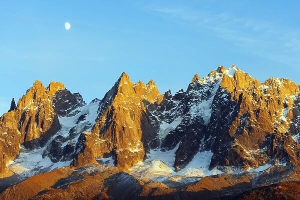 Moon rising over Aiguilles des Chamonix, Chamonix, Rhone Alps, Haute Savoie, France, Europe