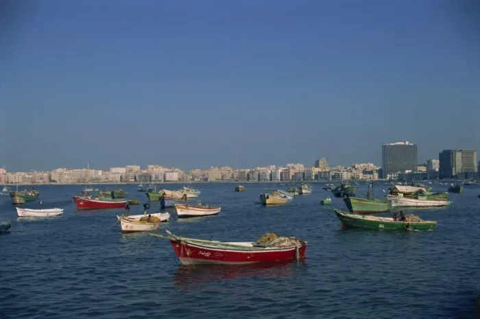 Framed Print : Moored boats before city skyline, Alexandria, Egypt, North Africa, Africa Framed Print : Moored boats before city skyline, Alexandria, Egypt, North Africa, Africa