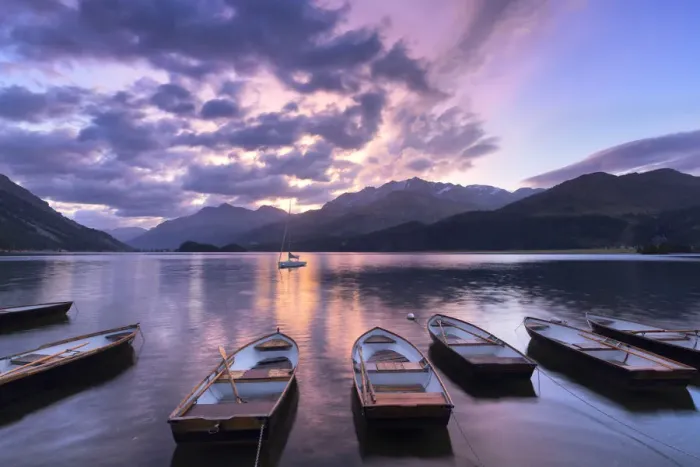 Framed Print : Moored boats in Lake of Sils at sunrise, Maloja Pass, Engadine valley, Graubunden Framed Print : Moored boats in Lake of Sils at sunrise, Maloja Pass, Engadine valley, Graubunden