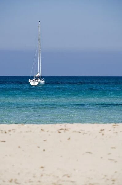 Moored yacht and beach