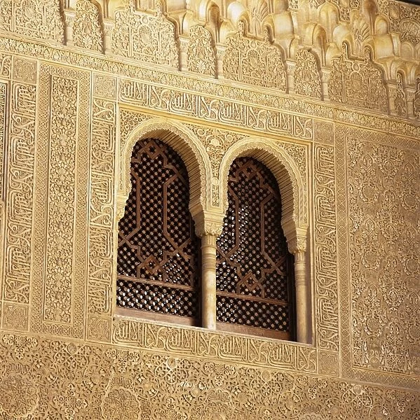 Detail of Moorish window and Arabic inscriptions in the Palacios Nazaries, Alhambra Palace, UNESCO World Heritage Site, Granada, Andalucia, Spain, Europe