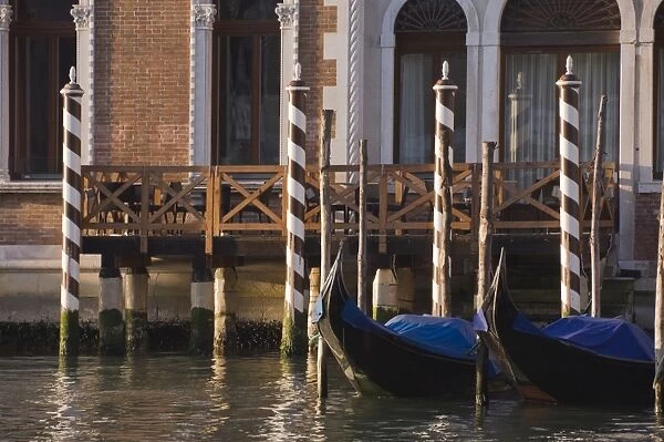 Morning light, mooring poles on the Grand Canal, Venice, UNESCO World Heritage Site