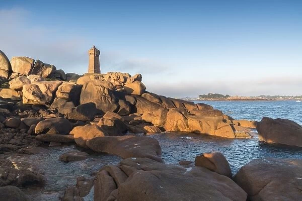 Morning light on Ploumanach lighthouse, Perros-Guirec, Cotes-d Armor, Brittany, France