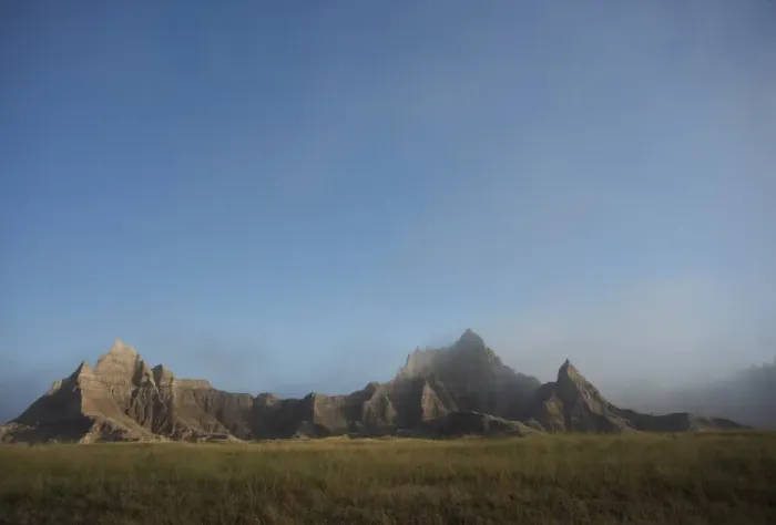 Framed Print : Morning mist rises in Badlands National Park, South Dakota, United States of America Framed Print : Morning mist rises in Badlands National Park, South Dakota, United States of America