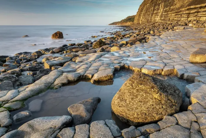 Framed Print : Morning sunlight lighting up the Ammonite Pavement near Lyme Regis, Dorset, England, United Kingdom, Europe Framed Print : Morning sunlight lighting up the Ammonite Pavement near Lyme Regis, Dorset, England, United Kingdom, Europe