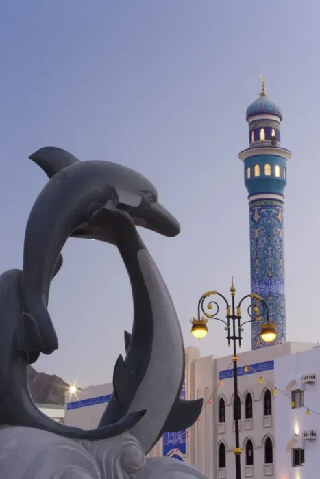 Framed Print : Mosque minaret and dolphin sculpture on the Mutrah Framed Print : Mosque minaret and dolphin sculpture on the Mutrah