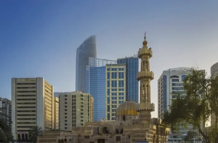 Framed Print : Mosque and modern buildings downtown Abu Dhabi, United Arab Emirates, Middle East Framed Print : Mosque and modern buildings downtown Abu Dhabi, United Arab Emirates, Middle East