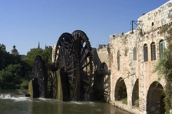 Mosque, water wheel on the Orontes River