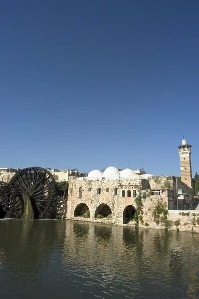 Mosque and water wheels on the Orontes River
