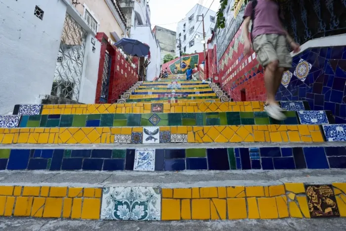 Framed Print : Motion blurred legs of man going down the Selaron Steps, 215 decorated steps Framed Print : Motion blurred legs of man going down the Selaron Steps, 215 decorated steps