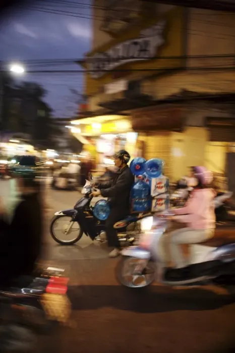 Framed Print : Motor cyclist carrying water bottles in traffic, Vietnam, Indochina, Southeast Asia, Asia Framed Print : Motor cyclist carrying water bottles in traffic, Vietnam, Indochina, Southeast Asia, Asia