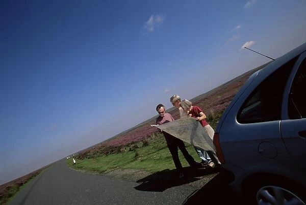Motorists looking at the map, North Yorkshire Moors, Yorkshire, England