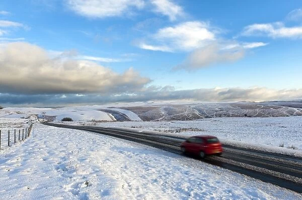 Motorists negotiate the B4520 road between Brecon and Builth Wells on the Mynydd Epynt moorland