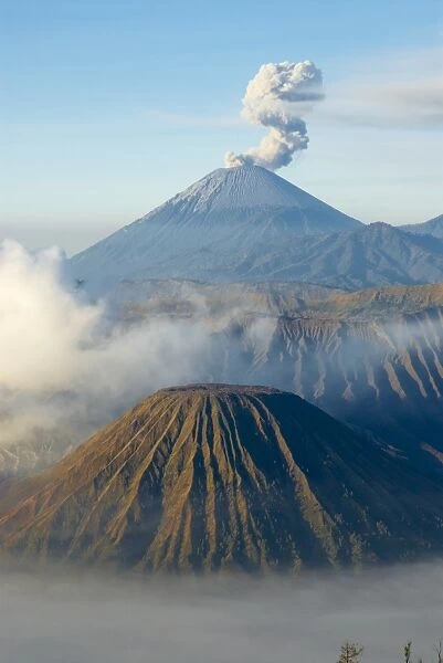 Mount Bromo, a volcano reaching 2392m, and Mount Semeru at 3676m early in the morning