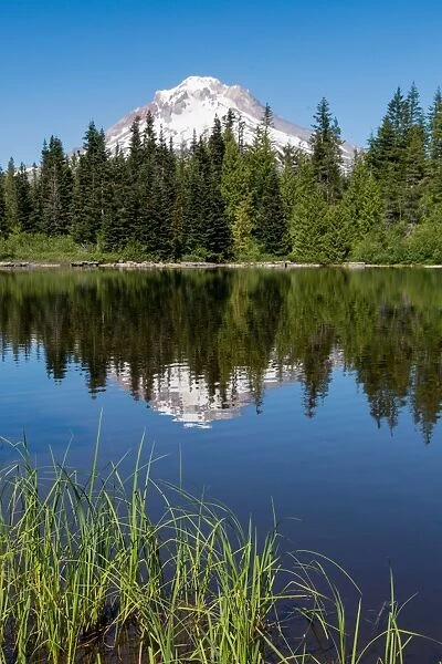 Mount Hood, part of the Cascade Range, reflected in the still waters of Mirror Lake