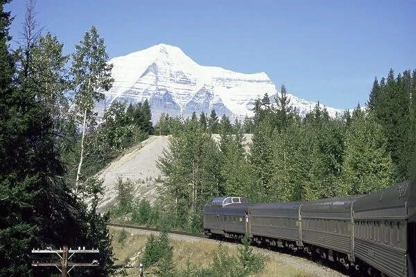 Mount Robson, highest peak in Canadian Rockies, 3964m, seen from Canadian transcontinental express between Jasper and Vancouver, British Columbia, Canada