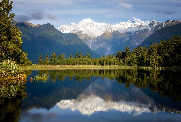 Mount Tasman and Aoraki (Mount Cook) reflected in Lake Matheson, South Island, New Zealand