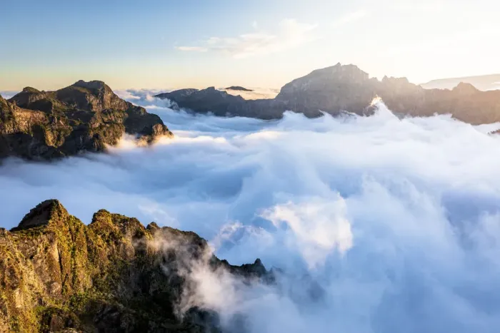 Framed Print : Mountain peaks emerging from clouds at sunset view from Pico Ruivo, Madeira, Portugal Framed Print : Mountain peaks emerging from clouds at sunset view from Pico Ruivo, Madeira, Portugal