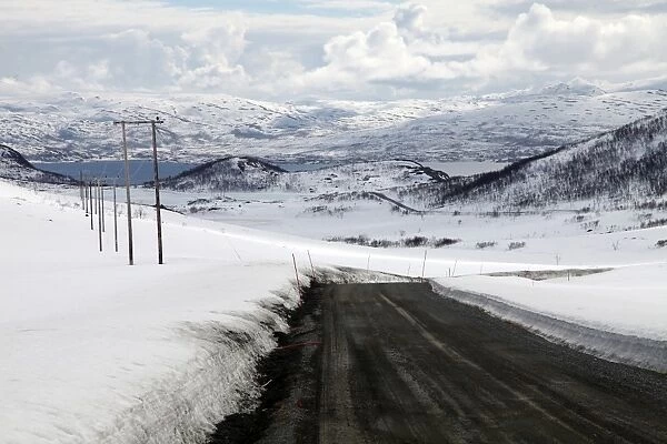 Mountain road in spring, Kvaloya (Whale Island), Troms, arctic Norway, Scandinavia, Europe