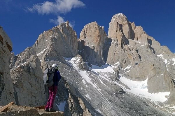 A mountaineer looks up towards Cerro Fitz Roy, El Chalten Massif, Patagonia, Argentina