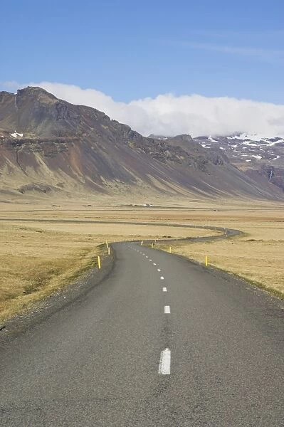 Mountains of Frodarheidi and empty Icelandic road
