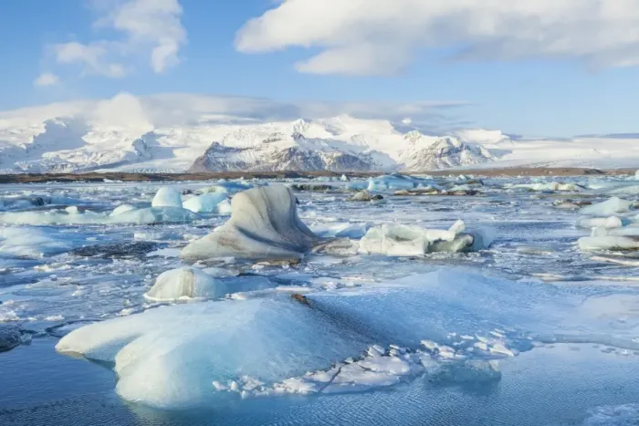 Framed Print : Mountains behind the icebergs locked in the frozen water of Jokulsarlon Iceberg Lagoon Framed Print : Mountains behind the icebergs locked in the frozen water of Jokulsarlon Iceberg Lagoon