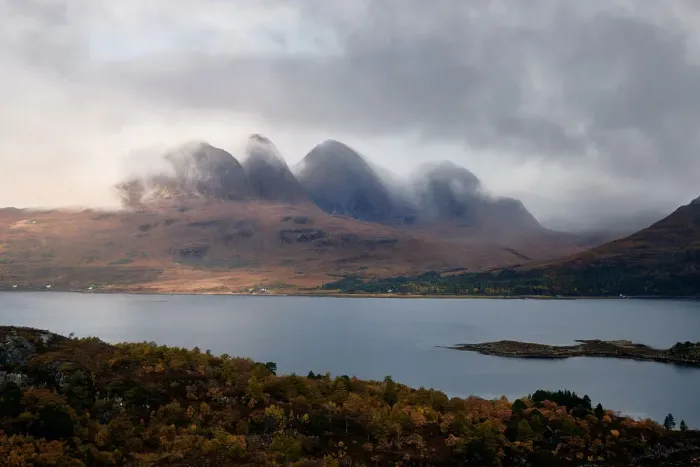 Framed Print : Mountains in the mist facing a lake in the Scottish Highlands, Scotland, United Kingdom Framed Print : Mountains in the mist facing a lake in the Scottish Highlands, Scotland, United Kingdom