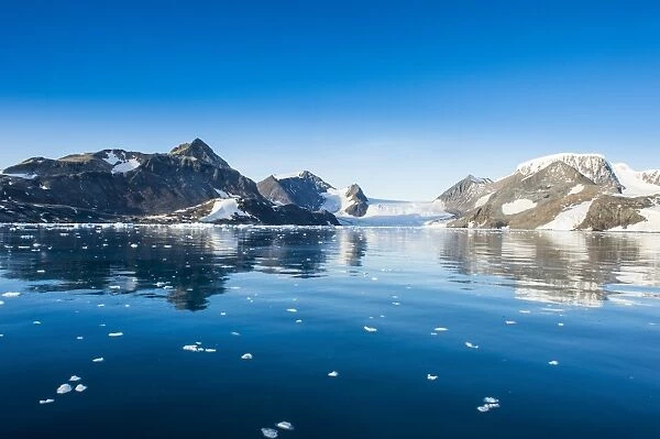 Mountains reflecting in glassy water of Hope Bay, Antarctica, Polar Regions