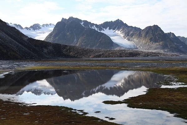 Mountains and reflections at Magdelenefjord, Svalbard