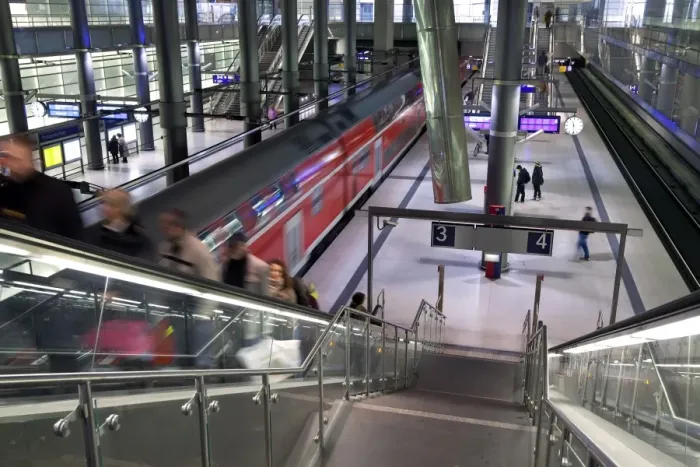 Framed Print : Moving train pulling into modern train station, Berlin, Germany, Europe Framed Print : Moving train pulling into modern train station, Berlin, Germany, Europe