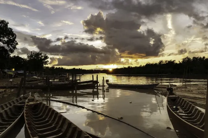 Framed Print : Mrauk U boat jetty at sunset showing waterlogged canoes in the foreground, Mrauk U Framed Print : Mrauk U boat jetty at sunset showing waterlogged canoes in the foreground, Mrauk U