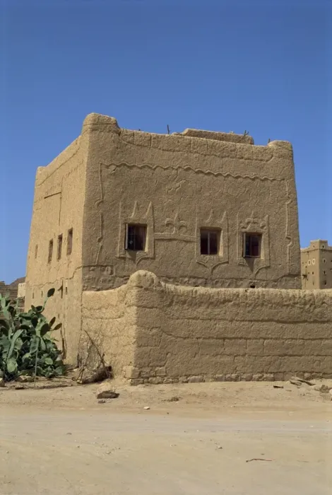 Framed Print : Mud built fortress house with decorated windows Framed Print : Mud built fortress house with decorated windows