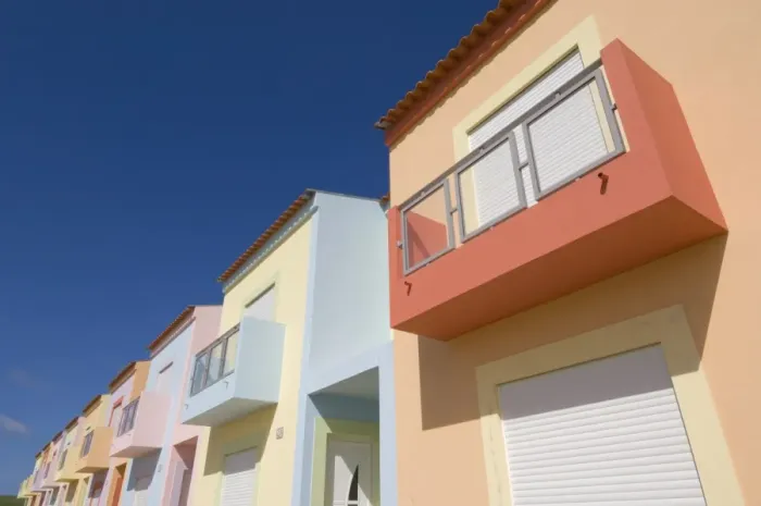 Framed Print : Multi-coloured new terraced houses, Vila da Bispo, near Sagres, Algarve, Portugal, Europe Framed Print : Multi-coloured new terraced houses, Vila da Bispo, near Sagres, Algarve, Portugal, Europe