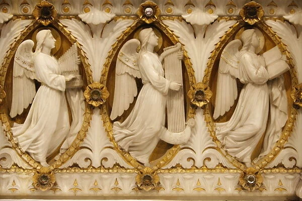 Musician angel sculpture on the altar in the crypt of Fourviere Basilica, Lyon, Rhone