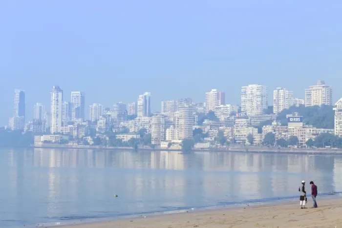 Framed Print : A Muslim and a Hindu man talking on Chowpatty beach with the skyscrapers of wealthy Malabar Hill behind, Mumbai, Maharashtra, India, Asia Framed Print : A Muslim and a Hindu man talking on Chowpatty beach with the skyscrapers of wealthy Malabar Hill behind, Mumbai, Maharashtra, India, Asia