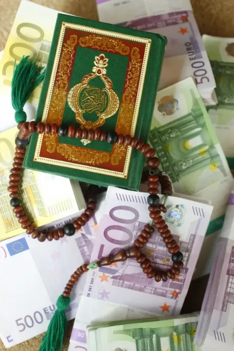 Framed Print : Muslim symbols and bank notes, France, Europe Framed Print : Muslim symbols and bank notes, France, Europe