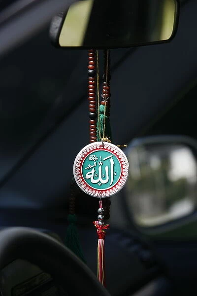 Muslim symbols in a car, Chatillon-sur-Chalaronne, Ain, France, Europe